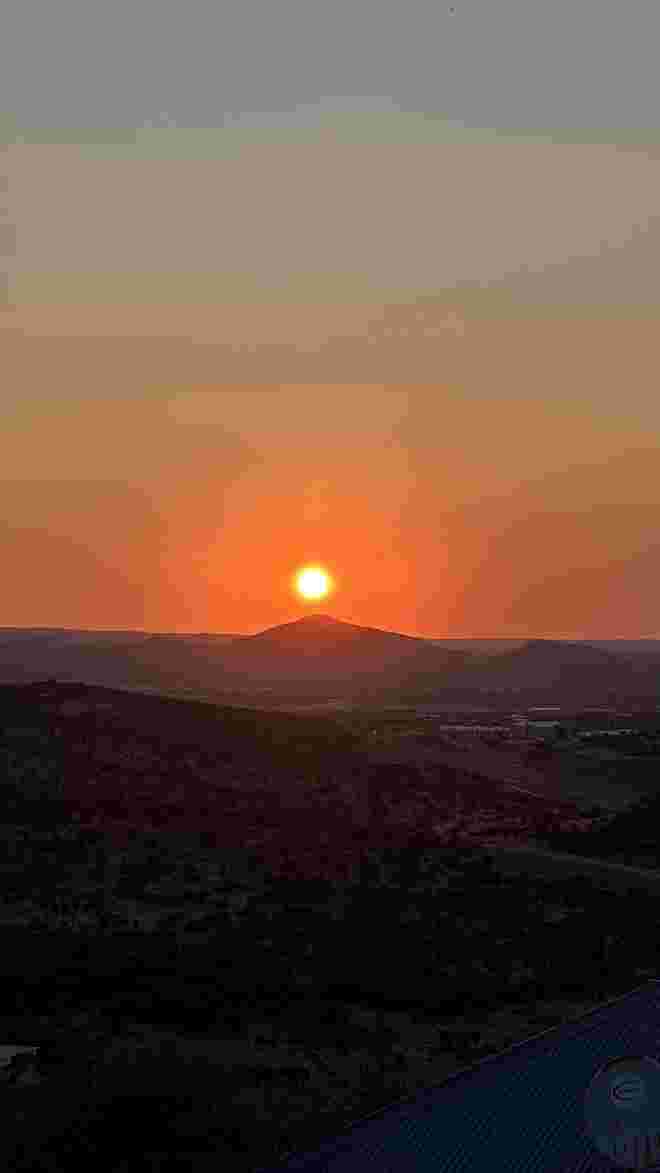 Sunset von Terrasse Rivercrossing Lodge