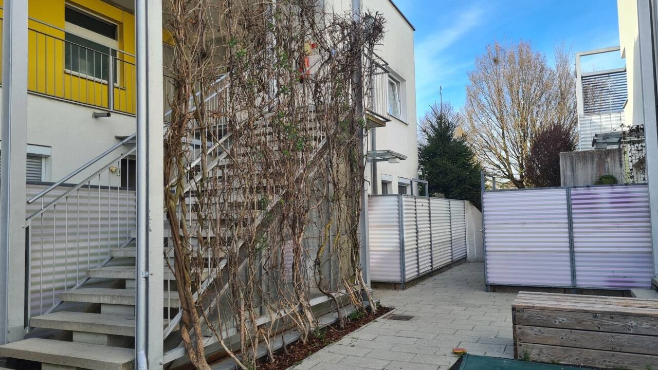 Hausaufgang in der Gartenstadt Aigen. 