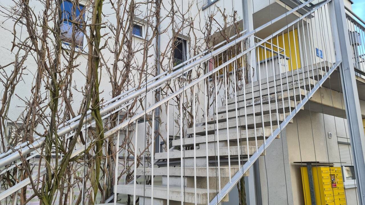 Hausaufgang in der Gartenstadt Aigen. 