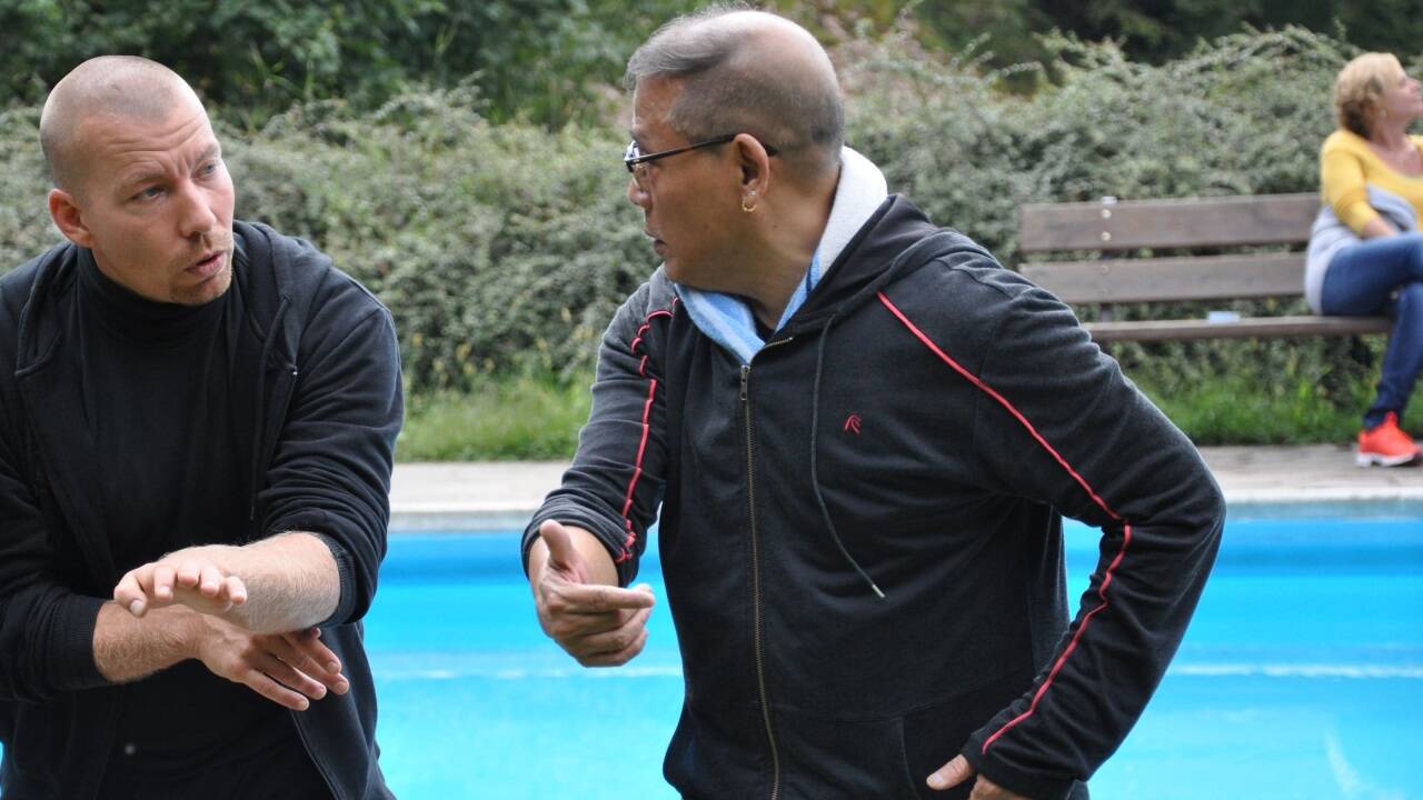 Großmeister Lau Kar Yung und Dominik Spies. 