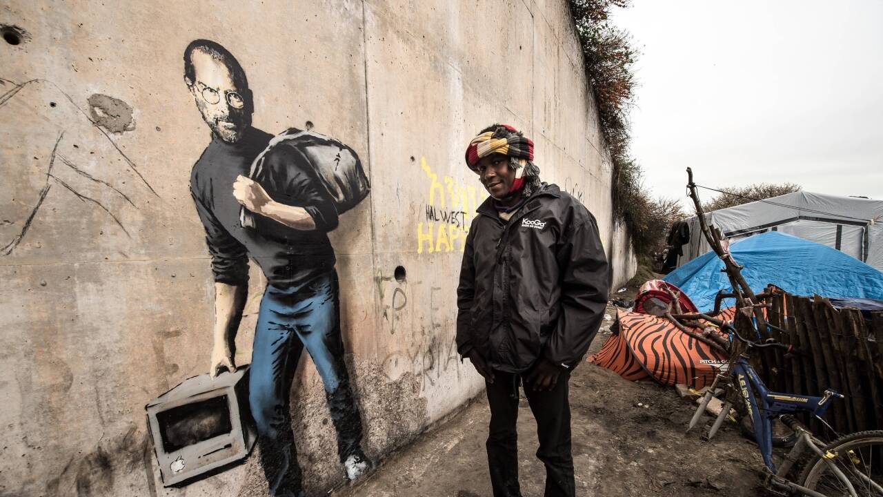 Ein Graffito von Steve Jobs in Calais. 