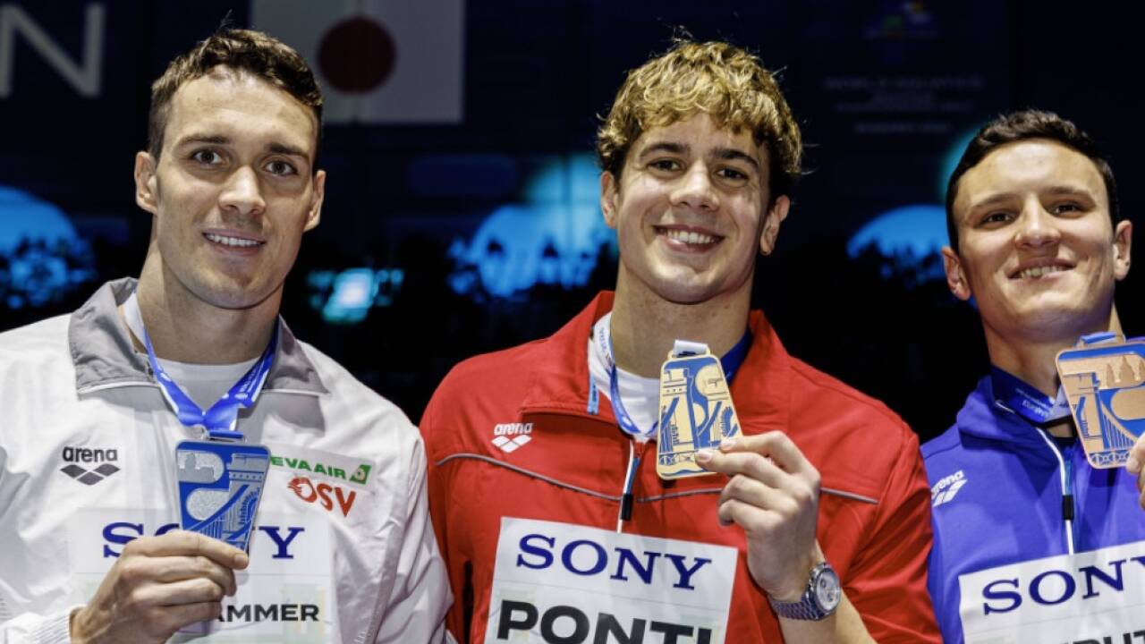 Bernhard Reitshammer/l. mit seiner ersten WM-Medaille 