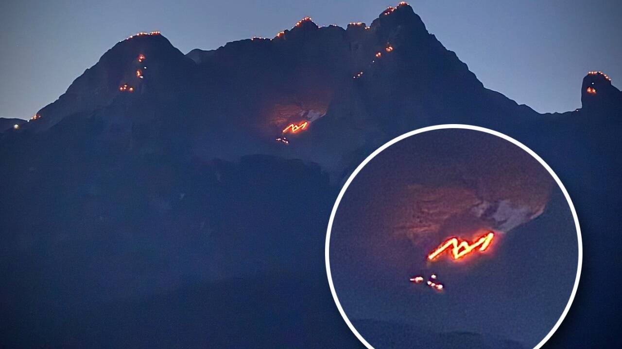 Feuer in der Schneegrube zeigen das Logo der Stadtgemeinde Saalfelden.  