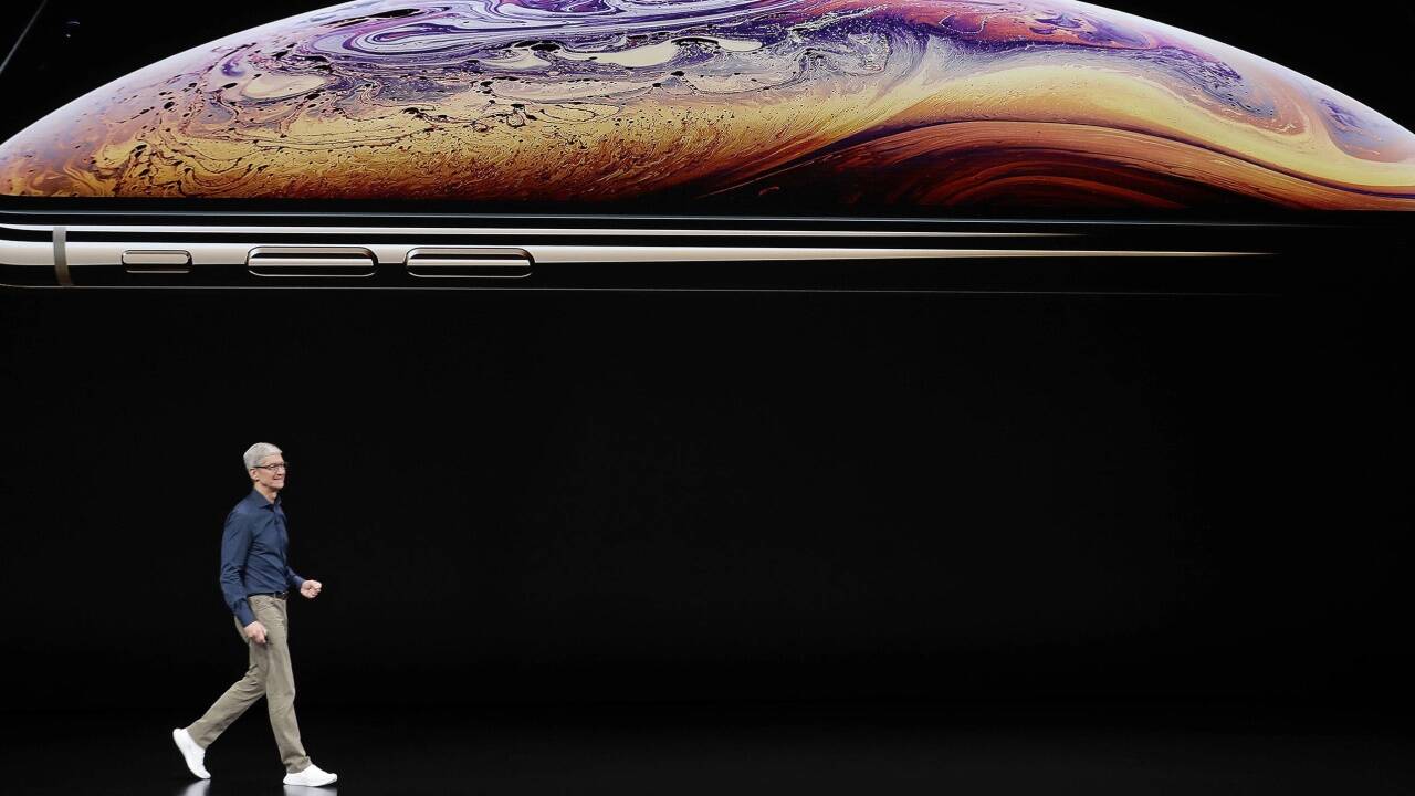Apple-Boss Tim Cook und sein neues iPhone. 