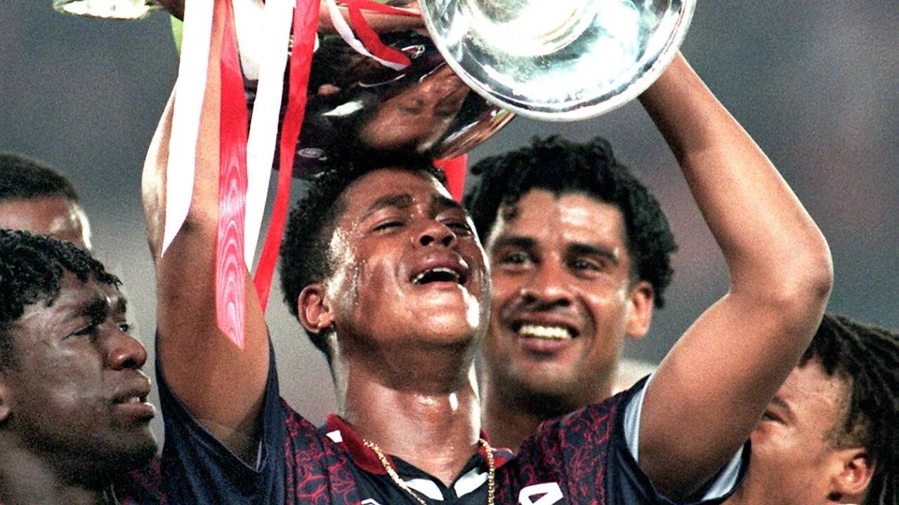 1995 stemmten Edgar Davids, Clarence Seedorf, Patrick Kluivert und Frank Rijkaard den Champions-League-Pokal hoch. 1995 stemmten Edgar Davids, Clarence Seedorf, Patrick Kluivert und Frank Rijkaard den Champions-League-Pokal hoch.