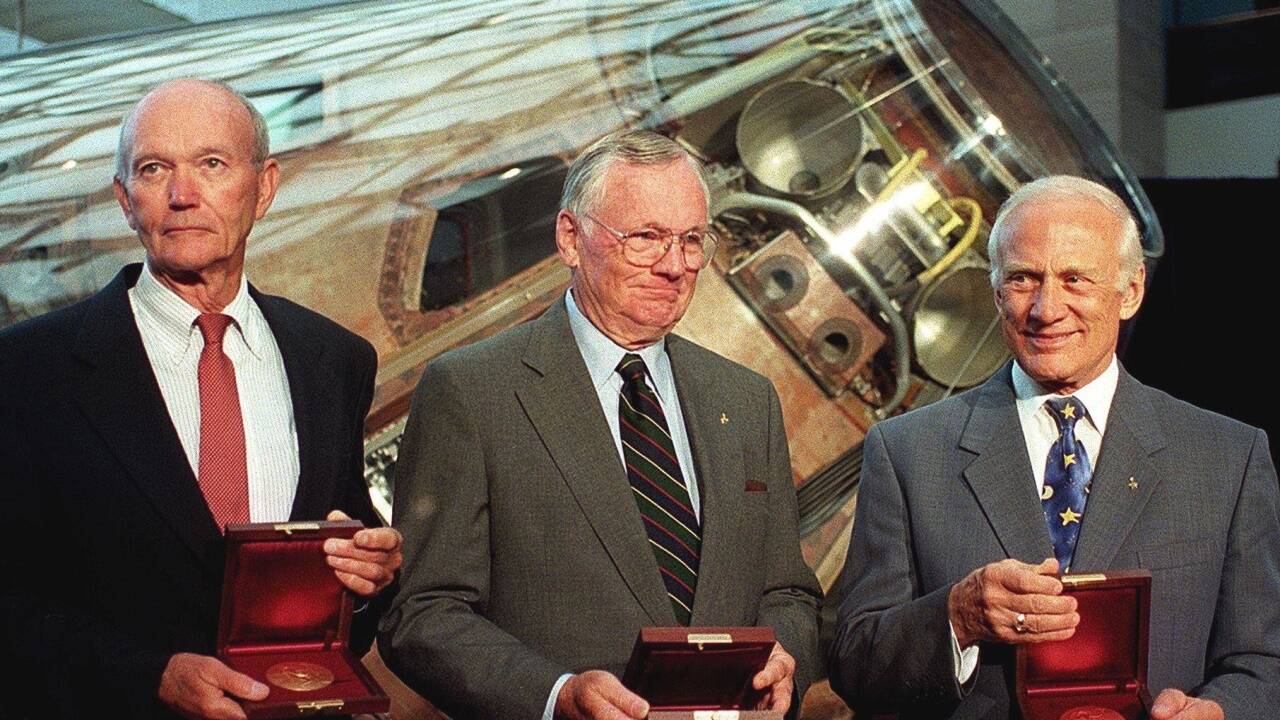 Michael Collins, Neil Armstrong and Buzz Aldrin werden am 20 Juli 1999 im National Air and Space Museum in Washington, DC., geehrt.  