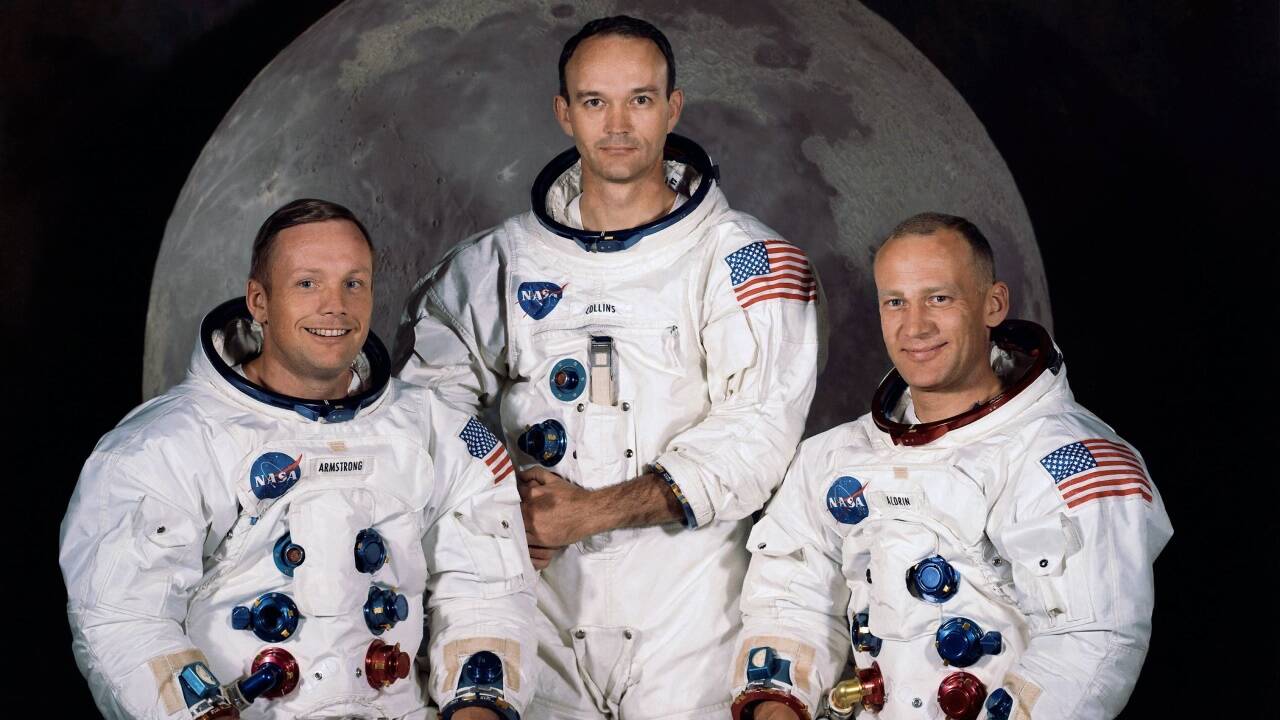 Neil A. Armstrong, Commander; Michael Collins, Module Pilot; Edwin E. 'Buzz' Aldrin, Lunar Module Pilot. -  