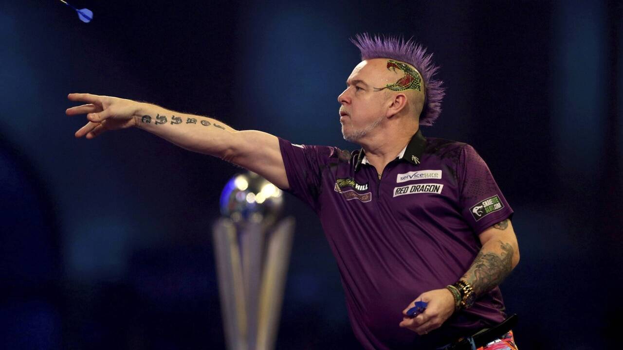 Paradiesvogel Peter Wright wurde erstmals Darts-Weltmeister. 