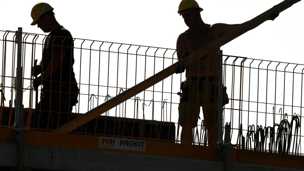 Arbeiter auf einer Baustelle. 