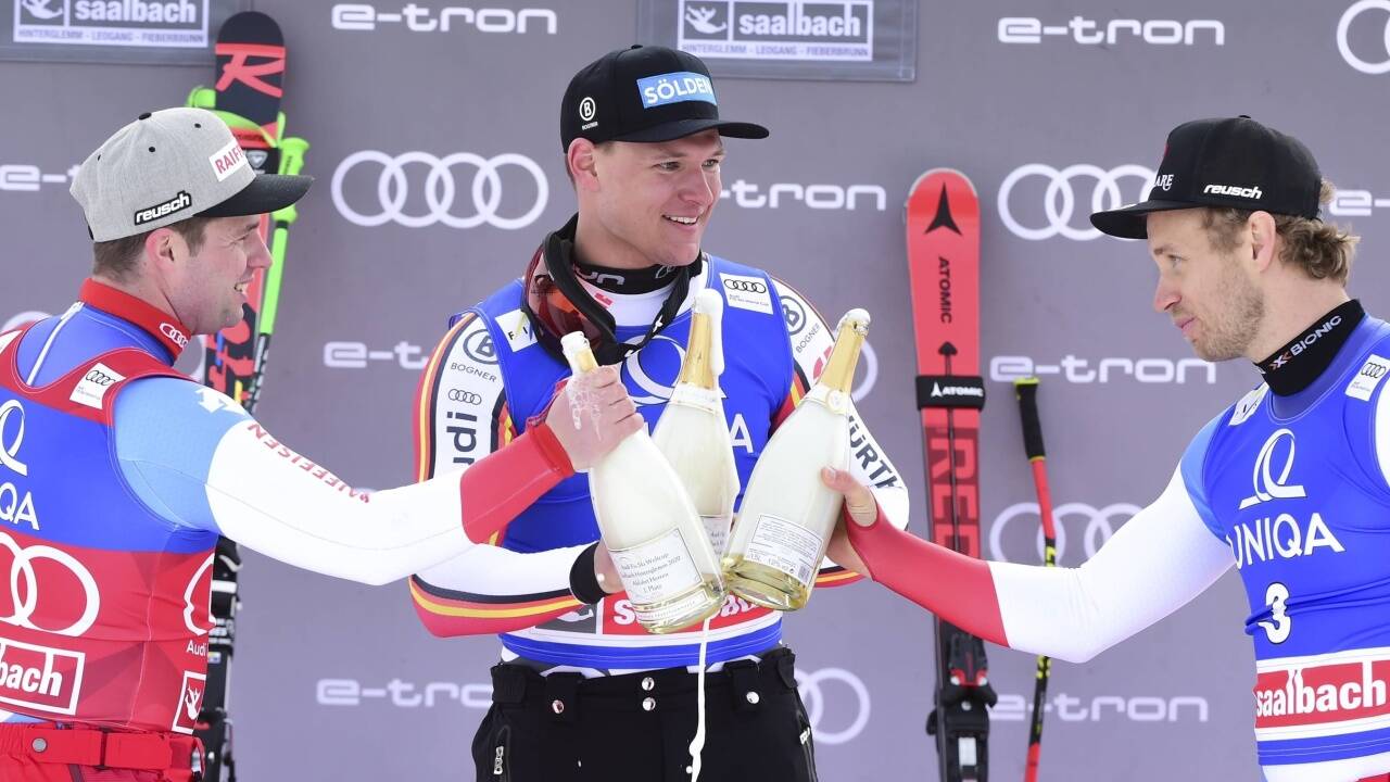 Das Podest: Feuz, Dreßen, Caviezel. 