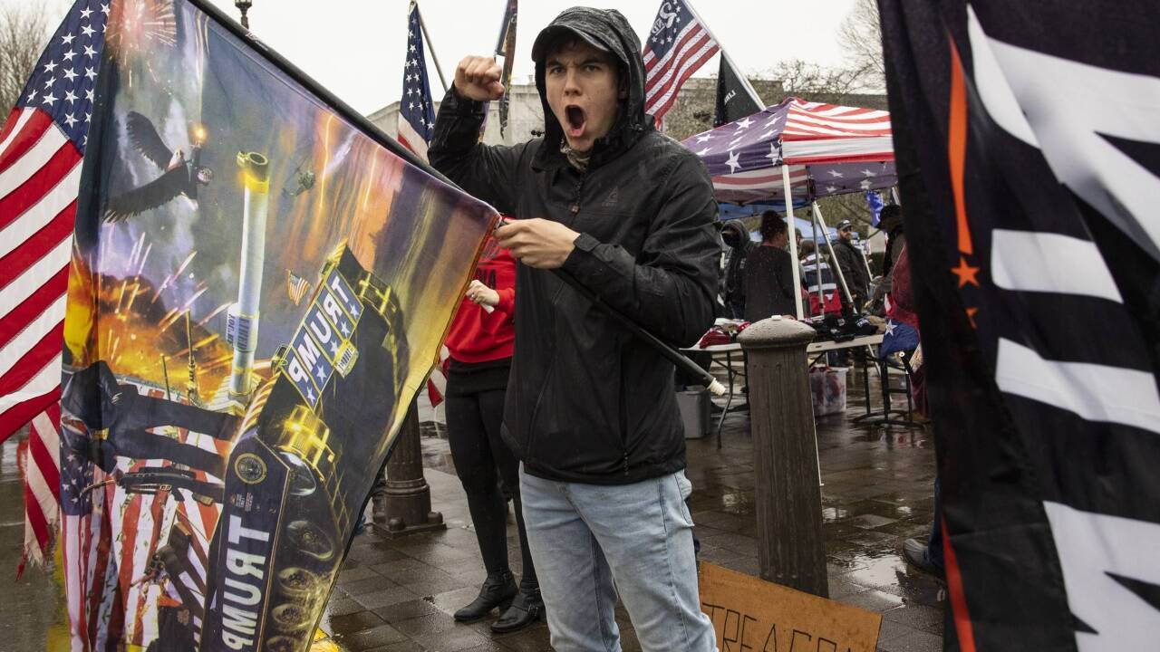Ein Trump-Anhänger bei der Demonstration vor dem Sturm auf das Kapitol. Ein Trump-Anhänger bei der Demonstration vor dem Sturm auf das Kapitol.