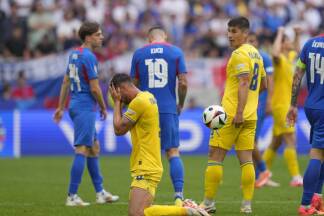 Die ukrainische Mannschaft jubelt nach ihrem Sieg gegen die Slowakei. 