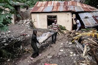 A paramedic carries the body of a person killed during Hurricane Melissa in Petit-Goave, about 68 km (42 miles) southwest of Port-au-Prince, on October 31, 2025. In Haiti, the country's civil defense agency said on October 30 that the death toll from Hurricane Melissa had risen to 30, with 20 people injured and another 20 missing. (Photo by Clarens SIFFROY / AFP)  A paramedic carries the body of a person killed during Hurricane Melissa in Petit-Goave, about 68 km (42 miles) southwest of Port-au-Prince, on October 31, 2025. In Haiti, the country's civil defense agency said on October 30 that the death toll from Hurricane Melissa had risen to 30, with 20 people injured and another 20 missing. (Photo by Clarens SIFFROY / AFP)