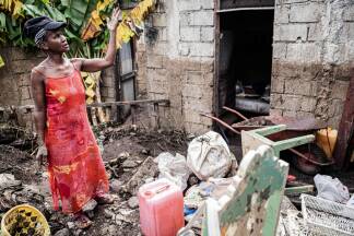 A woman stands in front of her damaged house in the aftermath of Hurricane Melissa, in Petit-Goave, about 68 km (42 miles) southwest of Port-au-Prince, on October 31, 2025. In Haiti, the country's civil defense agency said on October 30 that the death toll from Hurricane Melissa had risen to 30, with 20 people injured and another 20 missing. (Photo by Clarens SIFFROY / AFP)  A woman stands in front of her damaged house in the aftermath of Hurricane Melissa, in Petit-Goave, about 68 km (42 miles) southwest of Port-au-Prince, on October 31, 2025. In Haiti, the country's civil defense agency said on October 30 that the death toll from Hurricane Melissa had risen to 30, with 20 people injured and another 20 missing. (Photo by Clarens SIFFROY / AFP)