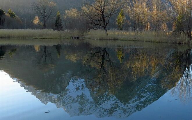 Der Grimming spiegelt sich im Schlossteich