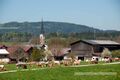 Hagingbauer Neumarkt am Wallersee mit Stadtpfarrkirche April 2016.jpg
