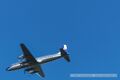 Douglas DC-6B Flying Bulls über Sommerholz.jpg