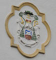 Erzbischöfliches Relief am Pfarramtsgebäude in Itzling.jpg