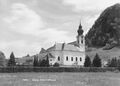 Gnigl Stadtpfarrkirche Mariä Himmelfahrt und hl. Michael um 1960.jpg