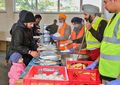 Camp Asfinag Essensausgabe der Sikh-Gemeinde.jpg