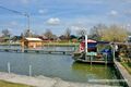 2025 04 02 Polizeibootshütte in der Wallersee-Ostbucht 02.jpg