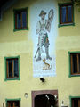 Wandbild mit Fischer neben dem Schloss Seehaus in Petting.jpg